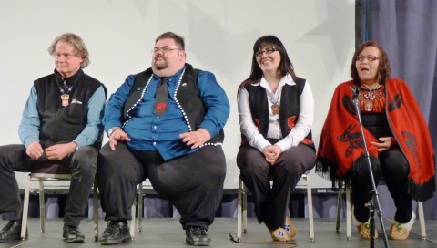 From the left, author and activist Wade Davis, Tlingit-Haida Central Council President Richard Peterson, Tahltan Central Council President Annita McPhee and Tahltan elder Mary Dennis wait to answer questions during a recent forum in Juneau on transboundary mines and the Tahltans’ “Sacred Headwaters.” (Ed Schoenfeld/CoastAlaska)