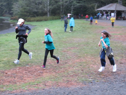 Girls running around Ward Lake.