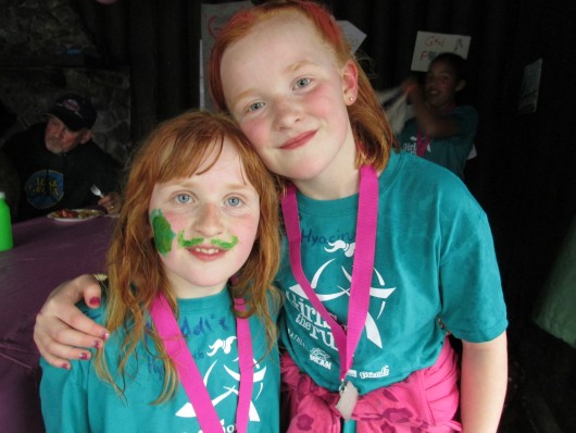 Sisters Maggie and Lena Hert are two Girls on the Run. Maggie says bullying is a struggle for  11-year-olds. 