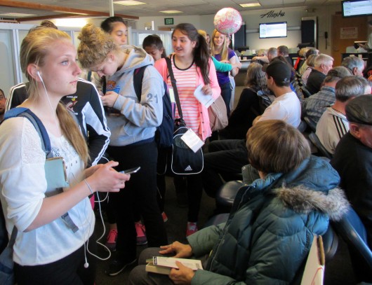 Melody Jacksch and the other Lady Kings at the Sitka airport, waiting to go back home to Ketchikan.