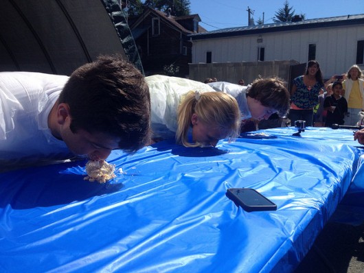 The three finalists for the young adult pie eating contest face off.