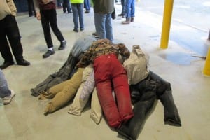 A pile of fake dead bodies lies waiting to be used for the emergency drill.