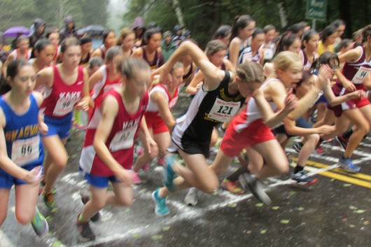 Taylee Nyquest (black uniform) starts her race at the regional XC meet in Ketchikan in September. 