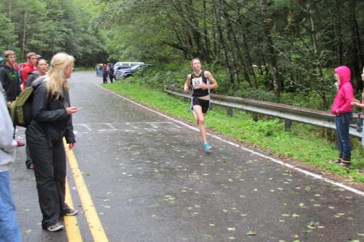 Sheila Nyquest cheers Taylee on as she finishes her race at the regional meet in Ketchikan.