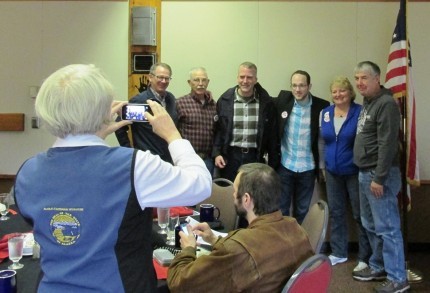 Local supporters take a photo with Senate candidate Dan Sullivan following his presentation at the Ketchikan Chamber of Commerce on Wednesday.