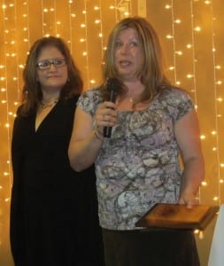 Dr. Marna Hall of Island to Island Veterinary Clinic accepts the Entrepreneur of the Year Award.
