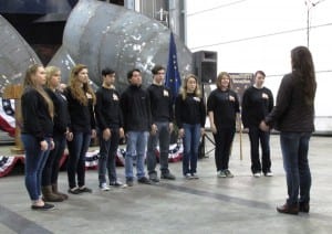Ketchikan High School choir members perform Alaska's Flag. 