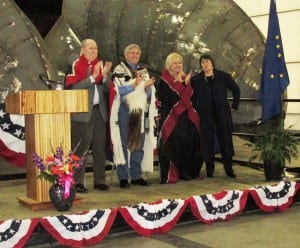 From left, Gov. Bill Walker, Lt. Gov. Byron Mallott, Donna Walker and Toni Mallott clap for local performers during the community reception Saturday at Ketchikan's shipyard.