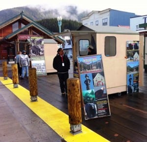 Tour vendors wait for cruise passengers to come check out the various tours available in Ketchikan.