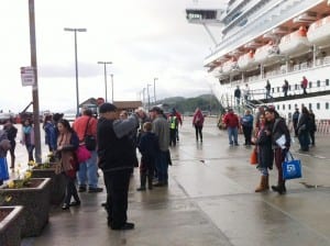 Lewis Banda takes a photo of fellow passengers on Ketchikan's cruise ship dock.