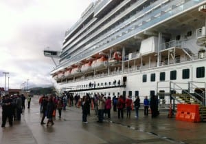 Tourists disembark from the Ruby Princess. 