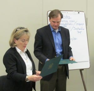 Undersecretary for Natural Resources and Environment for the U.S. Department of Agriculture Robert Bonnie and Alaska Regional Forester Beth Pendleton passed out certificates to Tongass Advisory Committee members after the committee's vote Friday in Ketchikan.