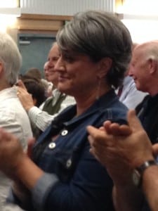 Keynote speaker Tammy Earnest applauds graduates