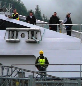 Crew members tie up the fast ferry Fairweather in Sitka. The ship and its sister, the Chenega, are scheduled to be tied up for most of this budget year. (Ed Schoenfeld/CoastAlaska News)