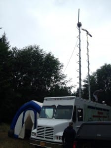 Volunteers set up antenna on the KRVS van