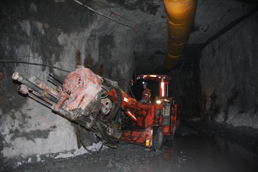 A heavy equipment operator moves a drill into position in a Brucejack Mine tunnel during exploration. (Photo courtesy Pretivm Resources)