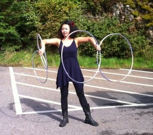Tika Hoop prepares for her performance outside of Tatsuda's IGA.