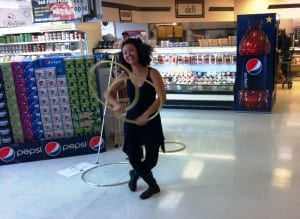 Tika Hoop performs inside Alaskan and Proud grocery store.