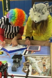 The judges confer and tally final scores.