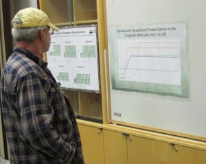 Ernie Eads looks at charts during an open house on the TLMP amendment. (Photo by Leila Kheiry)