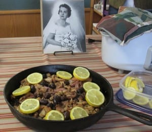 Kathy Bolling's Greek lemon chicken, with a photo of her mother in the background. (Photo by Leila Kheiry)