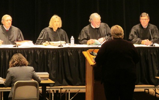 The Alaska Supreme Court listens to state attorney Mary Lundquist during the Supreme Court live event. (KRBD File Photo)