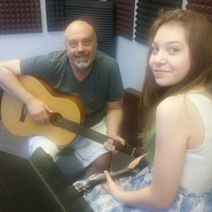 Dad and daughter duo Russell and Samantha Wodehouse perform during KRBD's Live Day, 2016.
