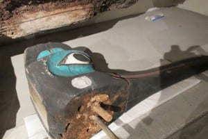 A large fragment from the Chief Kyan Totem Pole showing a metal rod repair.