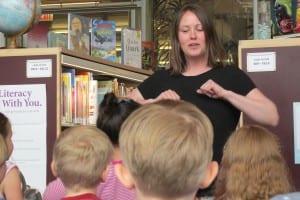 Amanda Kiely leads the children in songs and movement.
