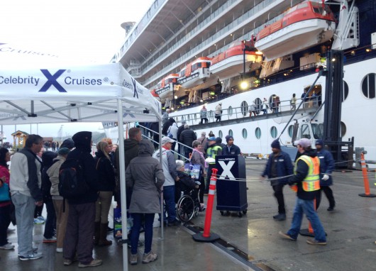 Passengers reboard the Celebrity cruise ship Infinity  after visiting Ketchikan Friday evening. The ship earlier ran into a dock, causing up to $3 million in damage to prt facilities (Photo by Ed Schoenfeld/CoastAlaska News).  
