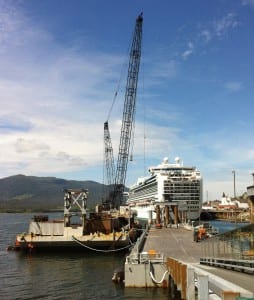 The repair barge for Turnagain Marine Construction is seen at Ketchikan's Berth 3, damaged when the cruise ship Infinity hit the dock on June 3rd. (Photo by Leila Kheiry)
