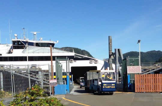 A baggage cart, nicknamed Starfish, leaves the Chenega in Sitka Sept. 3, 2015. The fast ferry is tied up for the rest of this fiscal year. (Photo by Ed Schoenfeld/CoastAlaska News)