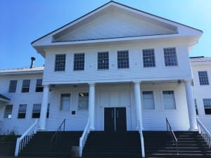 Metlakatla's Town Hall is a historic building in that community and an important gathering place. It's also where the basketball court is located. (Photo by Leila Kheiry)