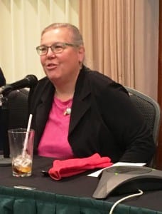 Judith McQuerry speaks at a Chamber of Commerce candidate forum. (Photo by Leila Kheiry)