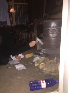 Simmonds lighting a bukhari.