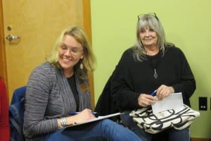 Anita Maxwell and Mary Ida Henrikson listen to ideas.