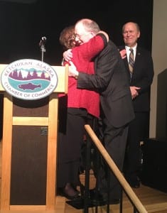 Dr. David Johnson gets a hug from Bett Jakubek after she announced him as the Citizen of the Year. Gov. Bill Walker is in the background. (Photo by Leila Kheiry)