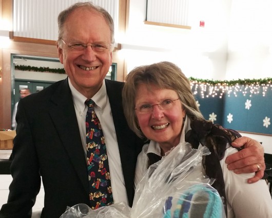 Retiring Doctor David Johnson and his wife, Jenny, are seen at the PeaceHealth Ketchikan holiday party. (PeaceHealth photo)