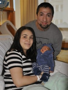 Giovanna Scudero and Gerardo Reyes hold their new baby, Jocko. (PeaceHealth photo)