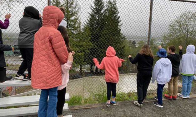 Ketchikan students look to the sky for Crystal Worl’s salmon formline plane