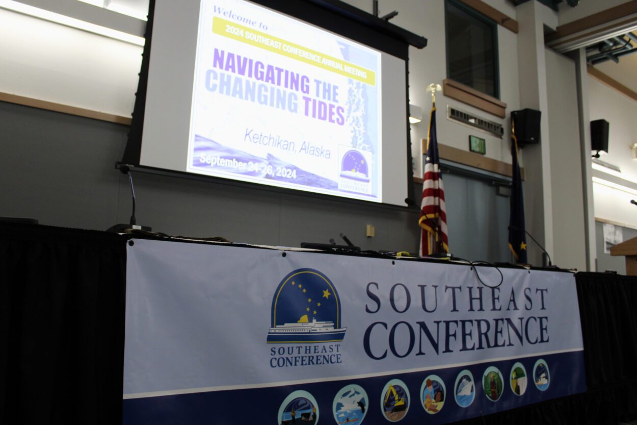 a conference table with a sign that reads "Southeast Conference"
